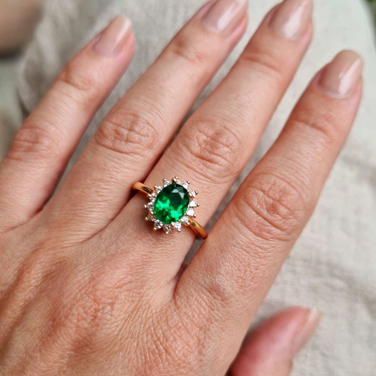 Emerald Green Oval Halo Adjustable Ring worn on finger