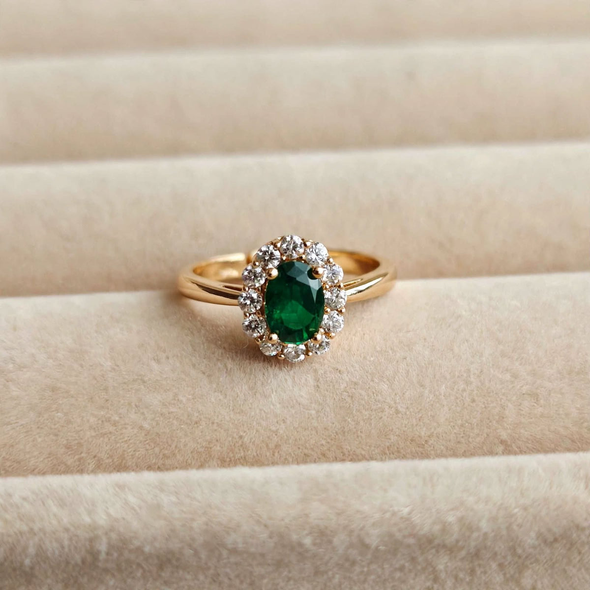 Emerald Green Oval Crystal Halo Adjustable Ring in beige velvet jewellery box