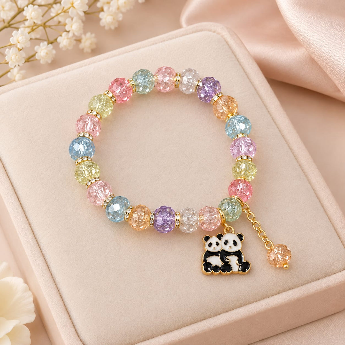 Multicolour Crystal Panda Charm Elastic Bracelet with pastel crystal beads and enamel panda charm on velvet display