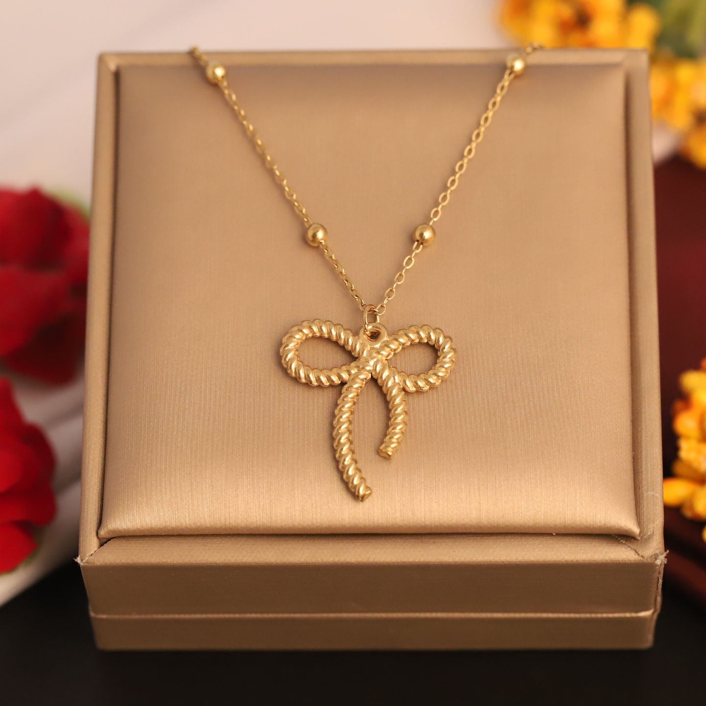 Anti Tarnish Gold Twisted Rope Bow Pendant Necklace