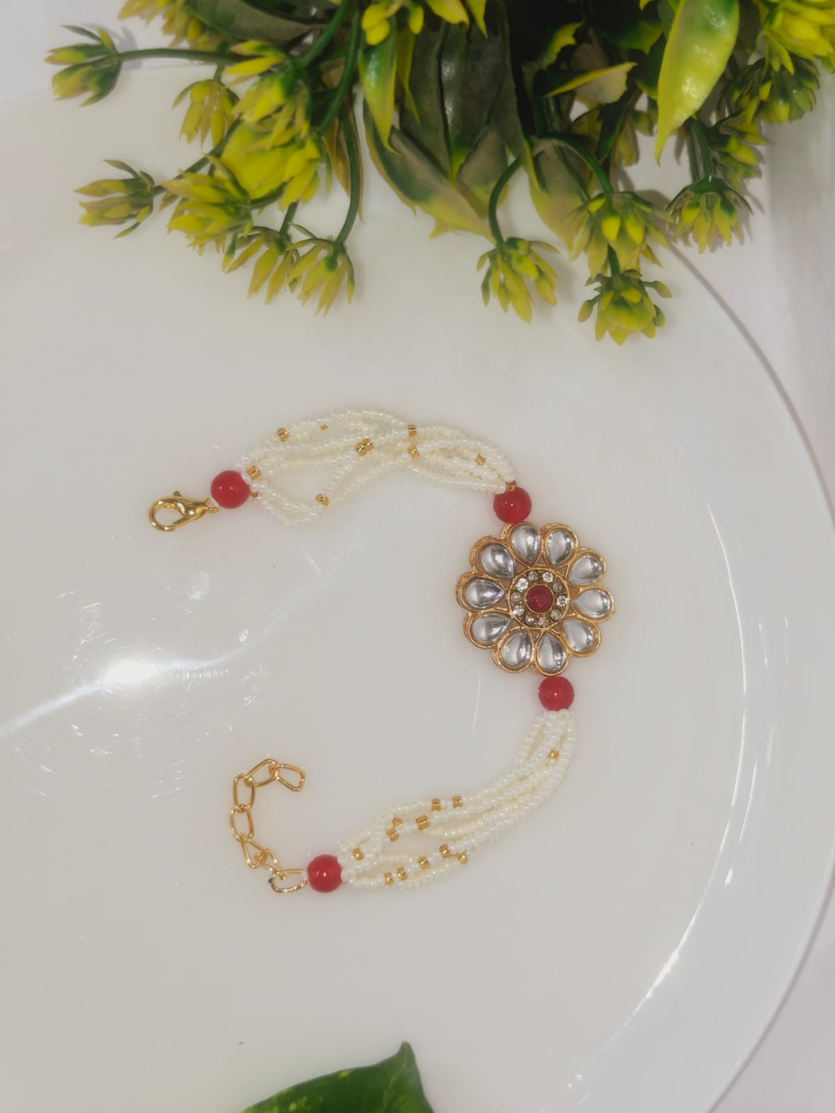 White Kundan Flower Bracelet Rakhi