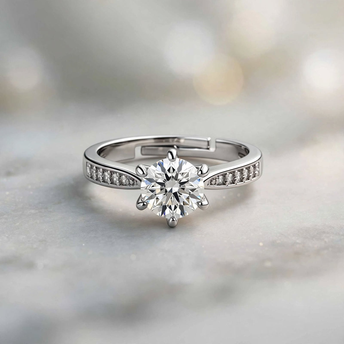 Rose gold baguette band ring on dark navy velvet background