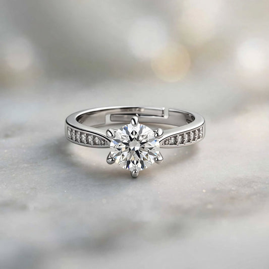 Rose gold baguette band ring on dark navy velvet background