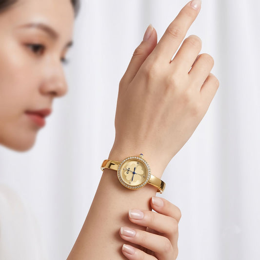Gold Diamond Bezel Bangle Watch