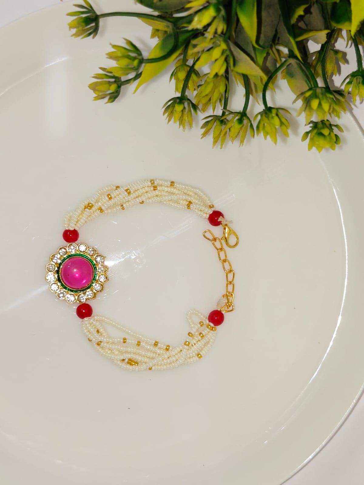 Pink Kundan Round Bracelet Rakhi